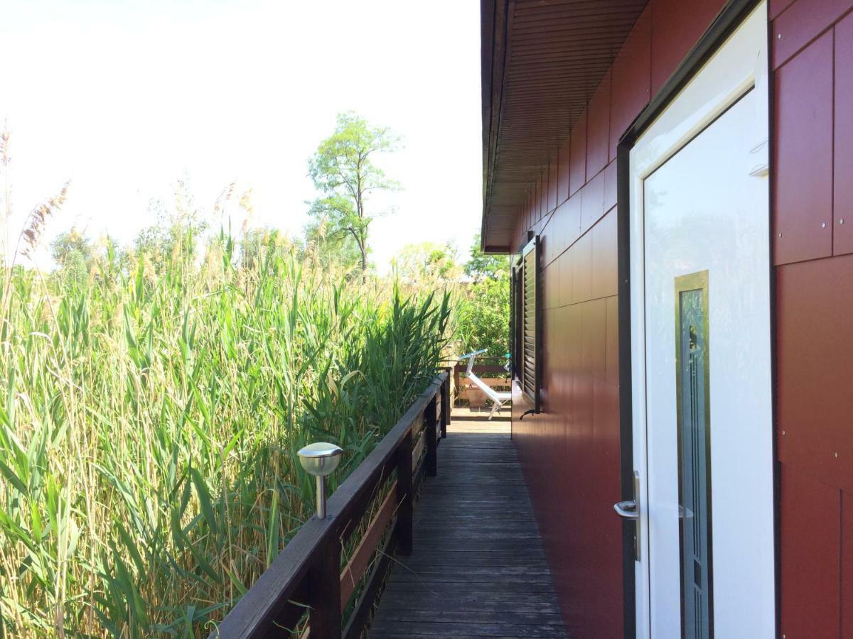 Pfahlbau In Weiden Am See Esterno foto